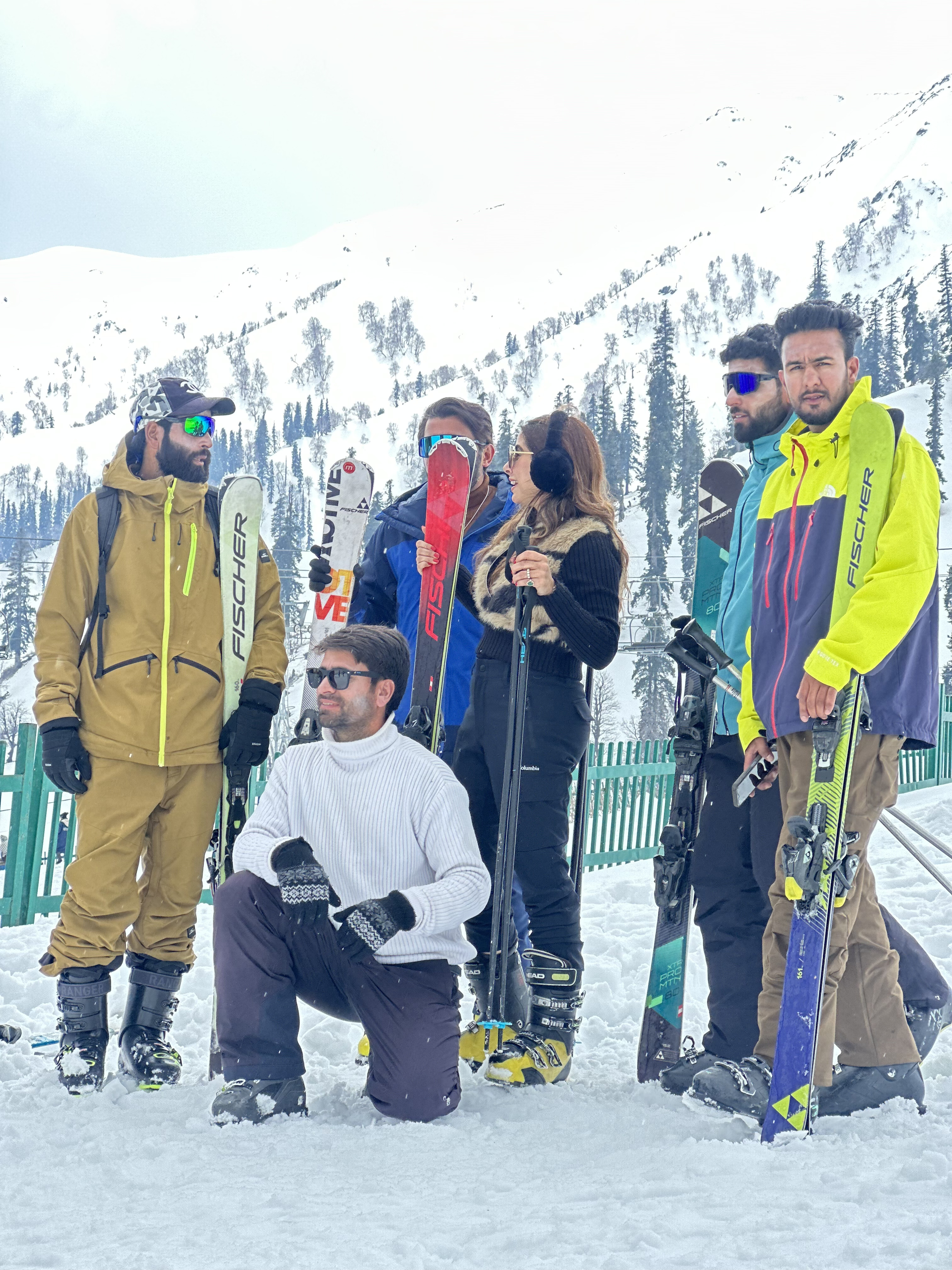 Skier carving fresh powder beneath Mount Apharwat in Gulmarg